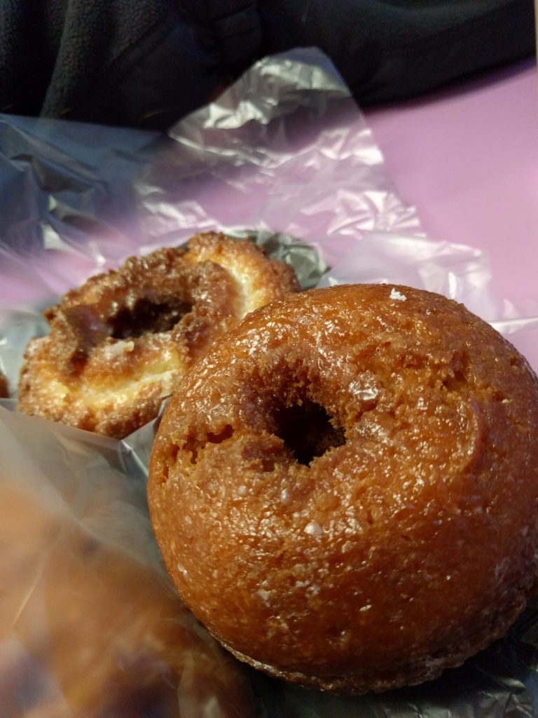 A galzed donut, thicker than most